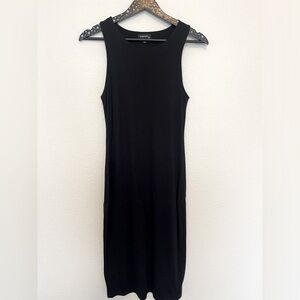 Originality Black Knee Length -or- Midi Length dress.